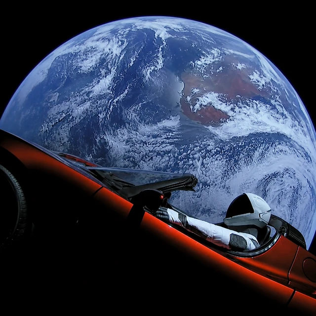 Starman in the Roadster drifting past Earth